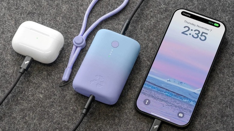 Nimble Champ power bank charging Airpods and an iPhone simultaneously
