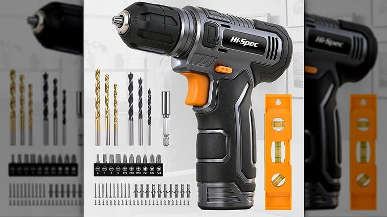 Hi-Spec drill driver placed along with a torpedo level and other small accessories.