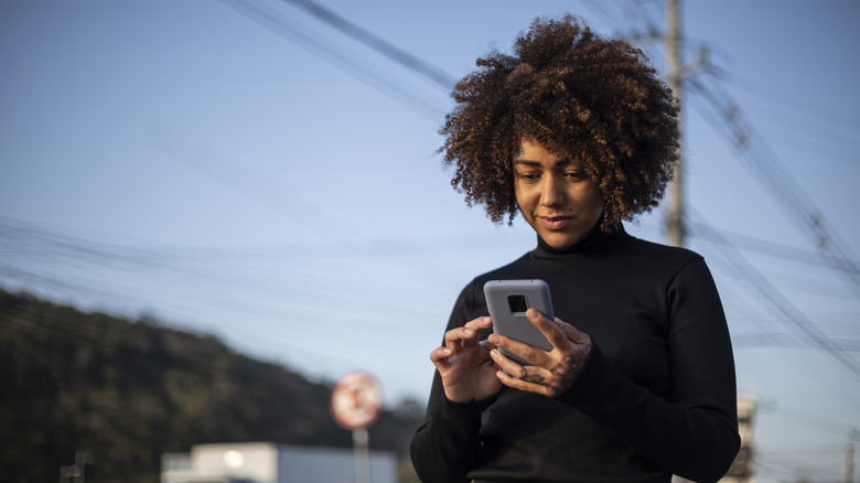 Woman checking her phone