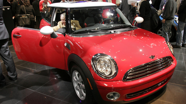 Red and white 2007 Mini Cooper at auto show.