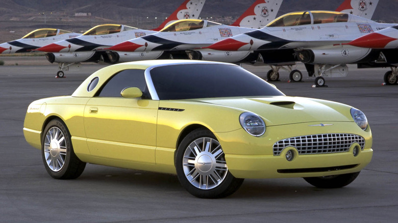 Ford Thunderbird concept parked in front of Thunderbird jets.