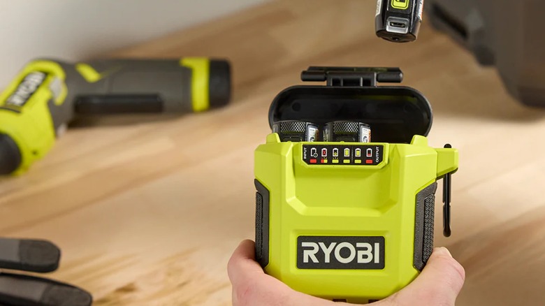A Ryobi battery charger being used to recharge USB lithium batteries