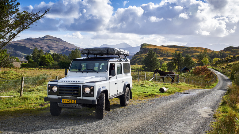 Classic Land Rover Defender in rural Scotland