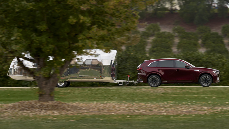 2025 Mazda CX-90 towing a trailer