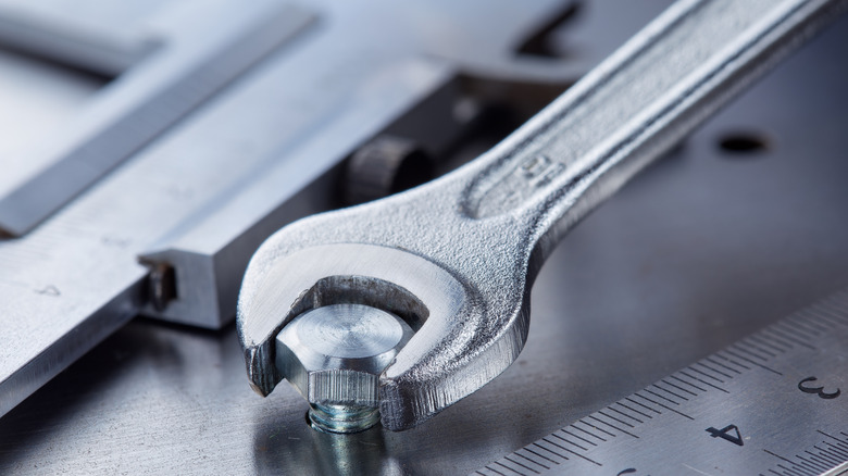 Wrench tightening bolt