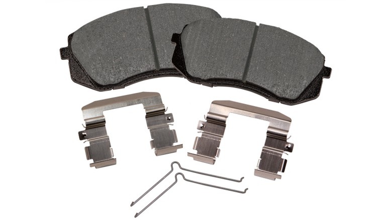 A basic set of Akebono ProACT brake pads against a white background.