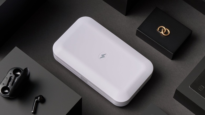 The purple version of the Phonesoap 3 phone sanitizer