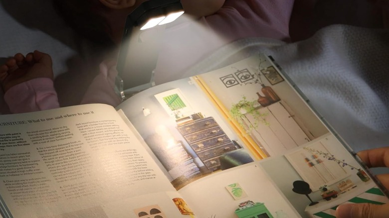 The Dott Arts book reading light night mounted on a book