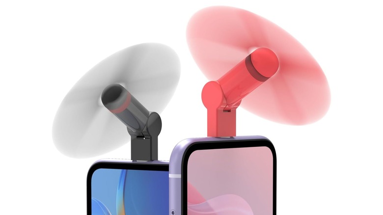 two XNMBRCE Mini Fans mounted on two phones