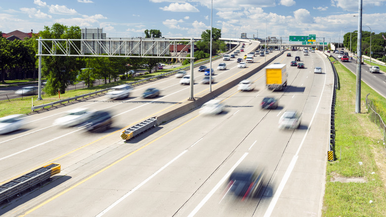 Cars in motion on a busy highway