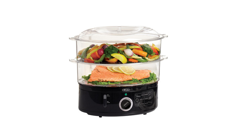 A Bella Two-Tier Food Steamer filled with fish and vegetables.