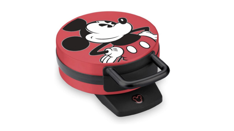 A red Disney Mickey Mouse Waffle Maker.