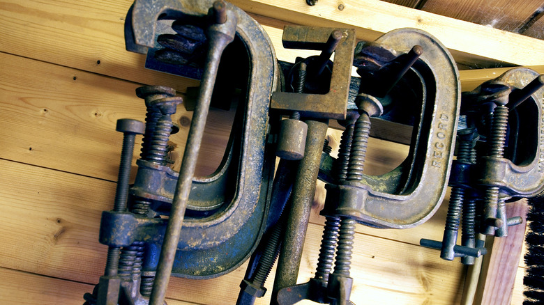 clamps on a storage shelf