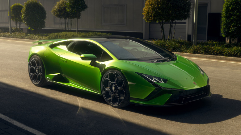 A green Lamborghini Huracan Technica on the street