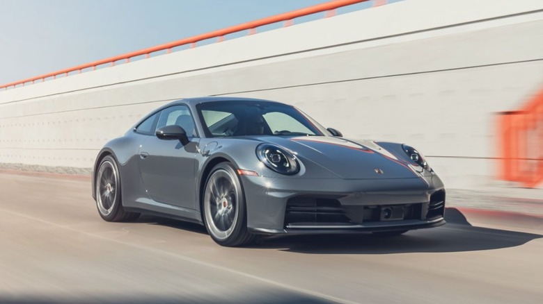 Porsche 911 being driven on a highway
