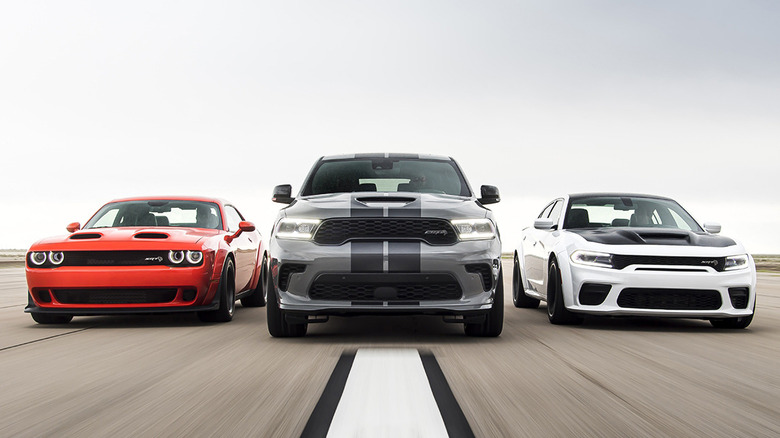 Three Dodge Hellcat vehicles lined up alongside each other