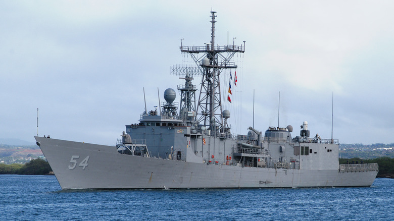 USS Ford (FFG-54) seen from port side in a bay