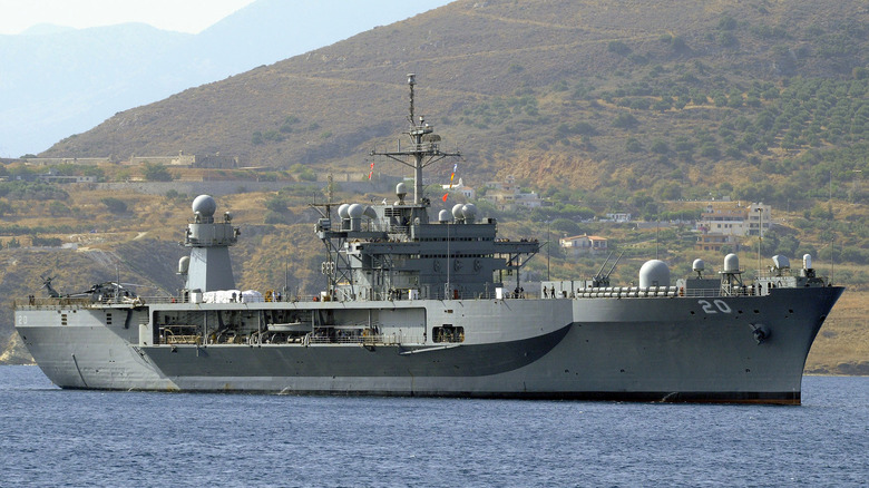USS Mount Whitney (LCC/JCC 20) seen from starboard with mountain in background