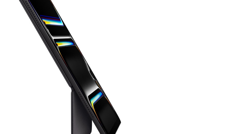 An iPad connected to a keyboard, seen from the side.