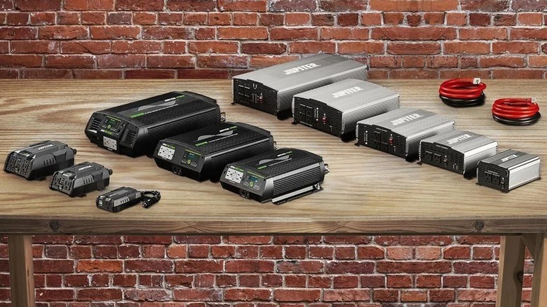Several Jupiter power inverters on table
