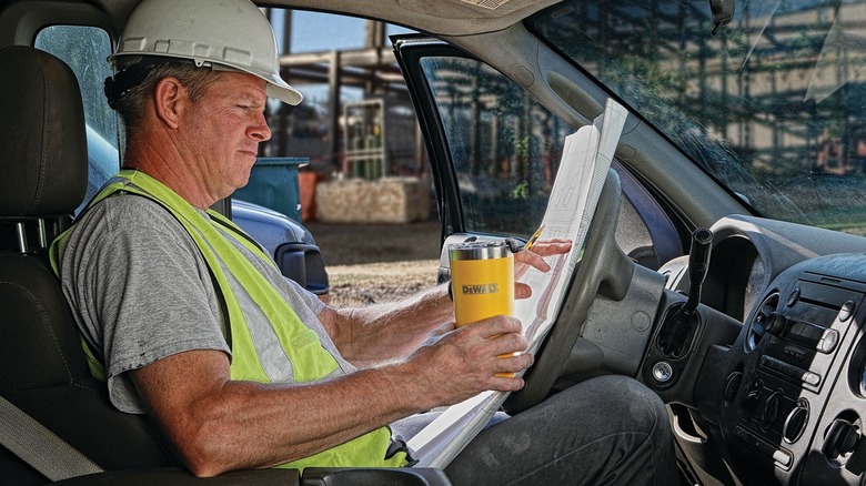 Person using DeWalt drinking tumbler