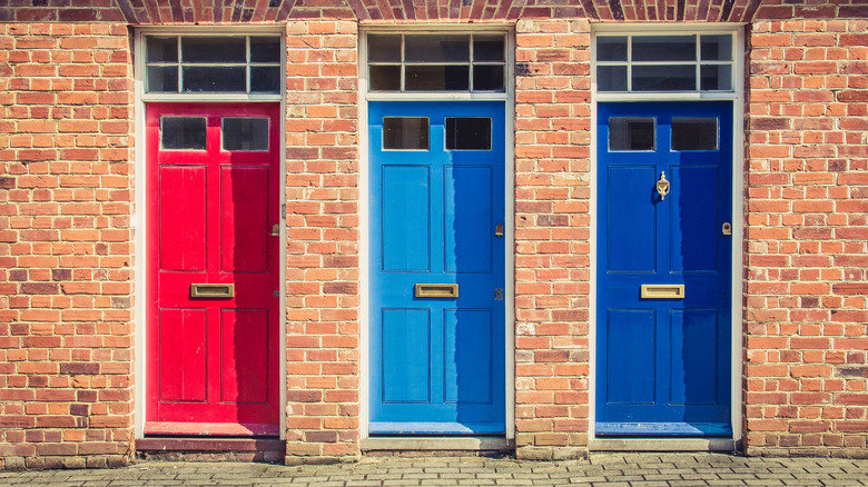 Three differently colored doors