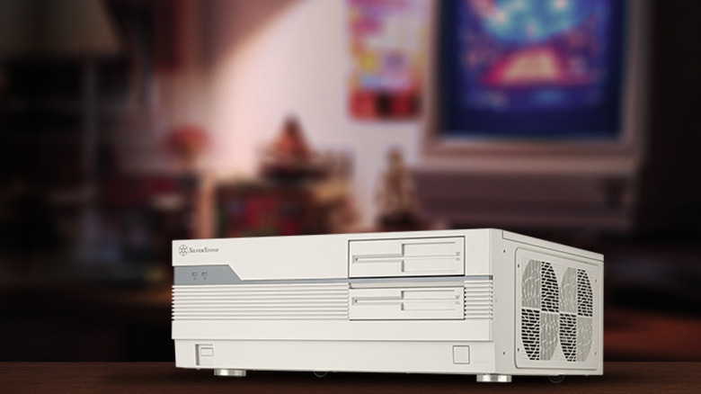 A Silverstone FLP01 PC case against a blurry background.