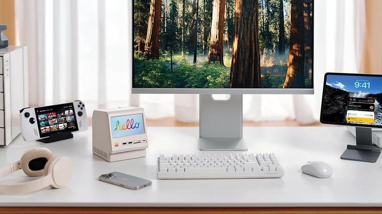 The Wokyis M5 Retro Dock Station on a busy white desk.