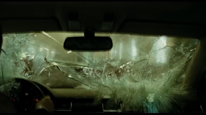 An internal camera shot of the windshield shattering on the A8L driven by Arthur Bishop (Jason Statham) in "Transporter 3" from 2003.
