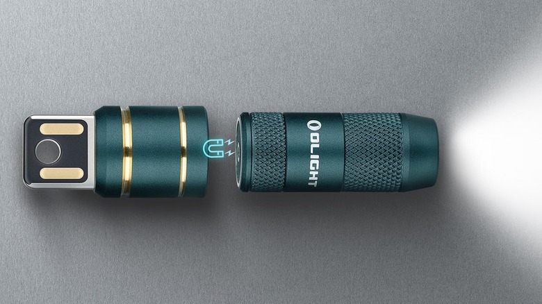 Olight Imini 2 flashlight keychain with its USB connector
