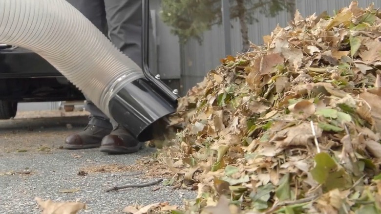 Person using Brave 4,400 CFM gas truck loader