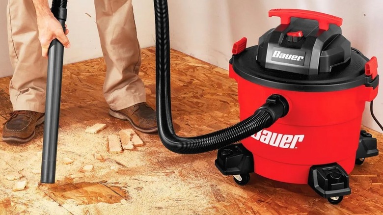 cleaning with Bauer wet/dry vac