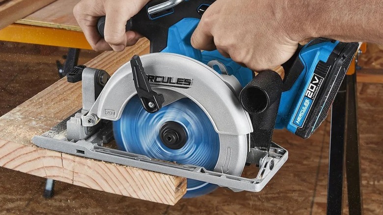 cutting a board with Hercules circular saw