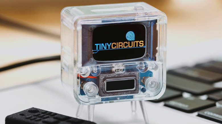 A tiny TV from Tiny Circuits with a remote controller