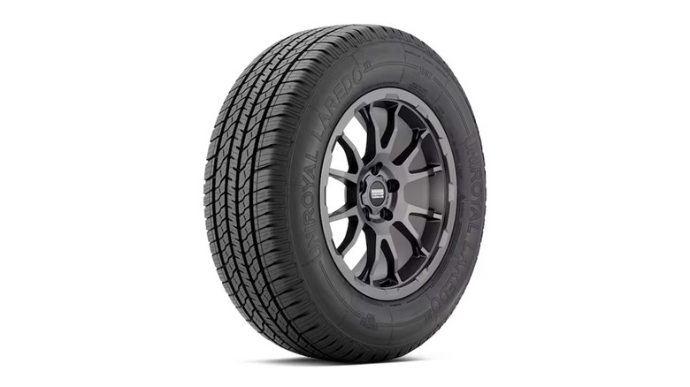 A Uniroyal Laredo HT tire stock image with a white background