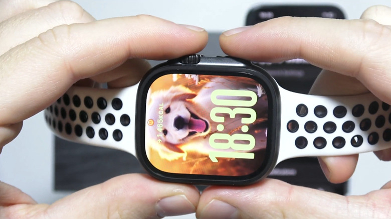 A person taking screenshots on an Apple Watch