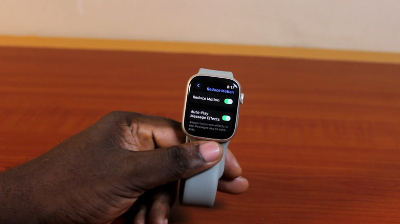 A person changing accessibility settings on the Apple Watch