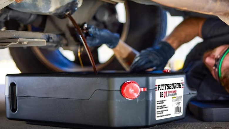 performing an oil change with Pittsburgh drain pan container