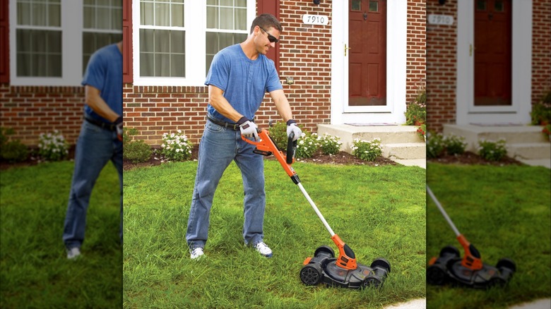 mowing lawn with Black+Decker multi-function mower