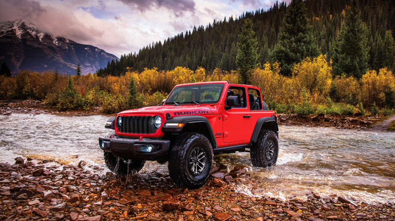 2025 Jeep Wrangler Two Door on a river crossing front 3/4 view