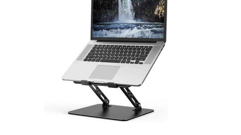 A laptop stand over a white background