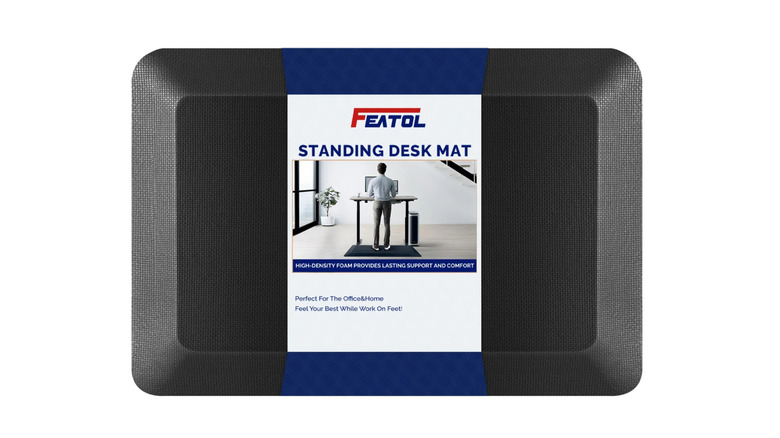 A standing desk mat over a white background