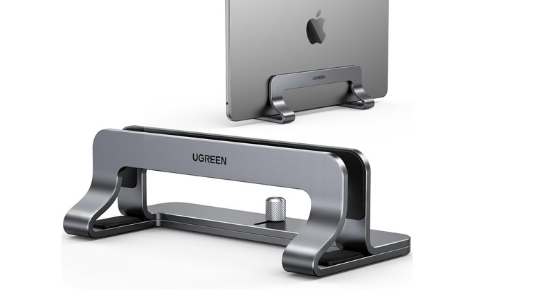 A laptop stand over a white background
