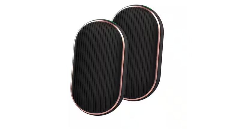 Set of two black oval devices with a rose gold border