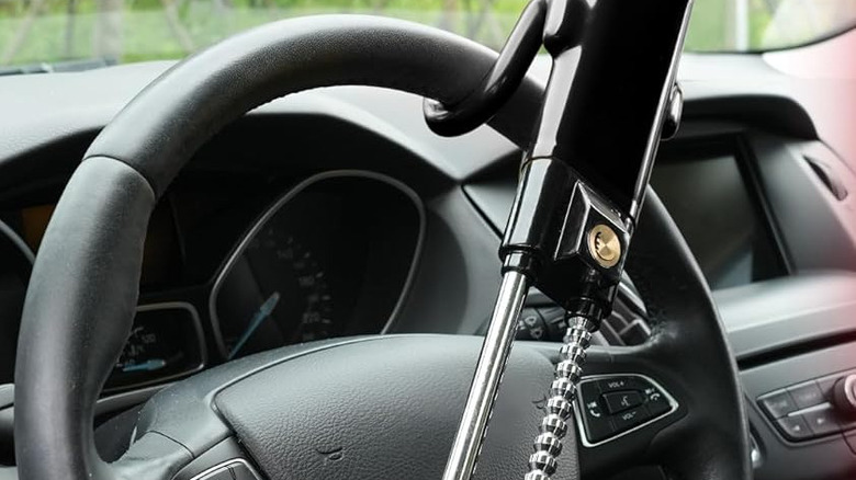 An anti-theft steering lock installed inside a car