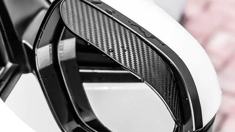 The Pincuttee rain visor installed on a car's side mirrors