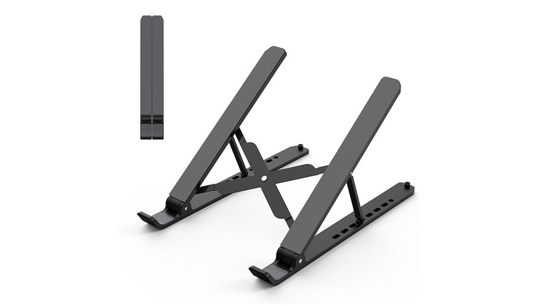 Laptop stand on a white background