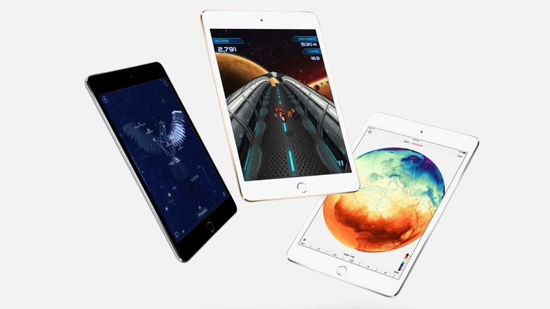 Three iPad minis on a white background