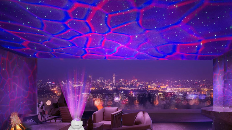 A room with the Enokik galaxy LED light projecting on the ceiling.