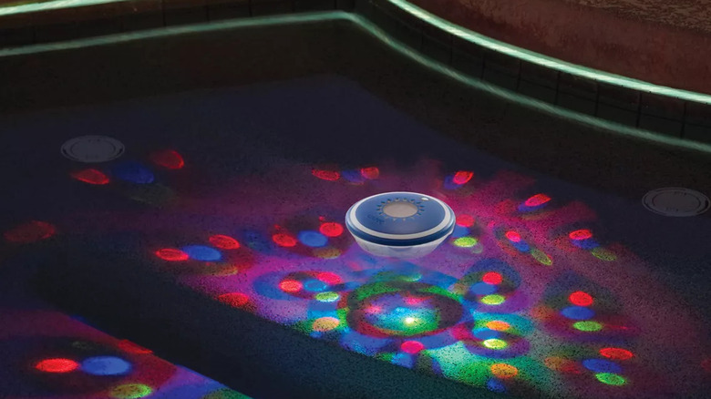 Game Solar Underwater Light Show doing a light show in a pool.